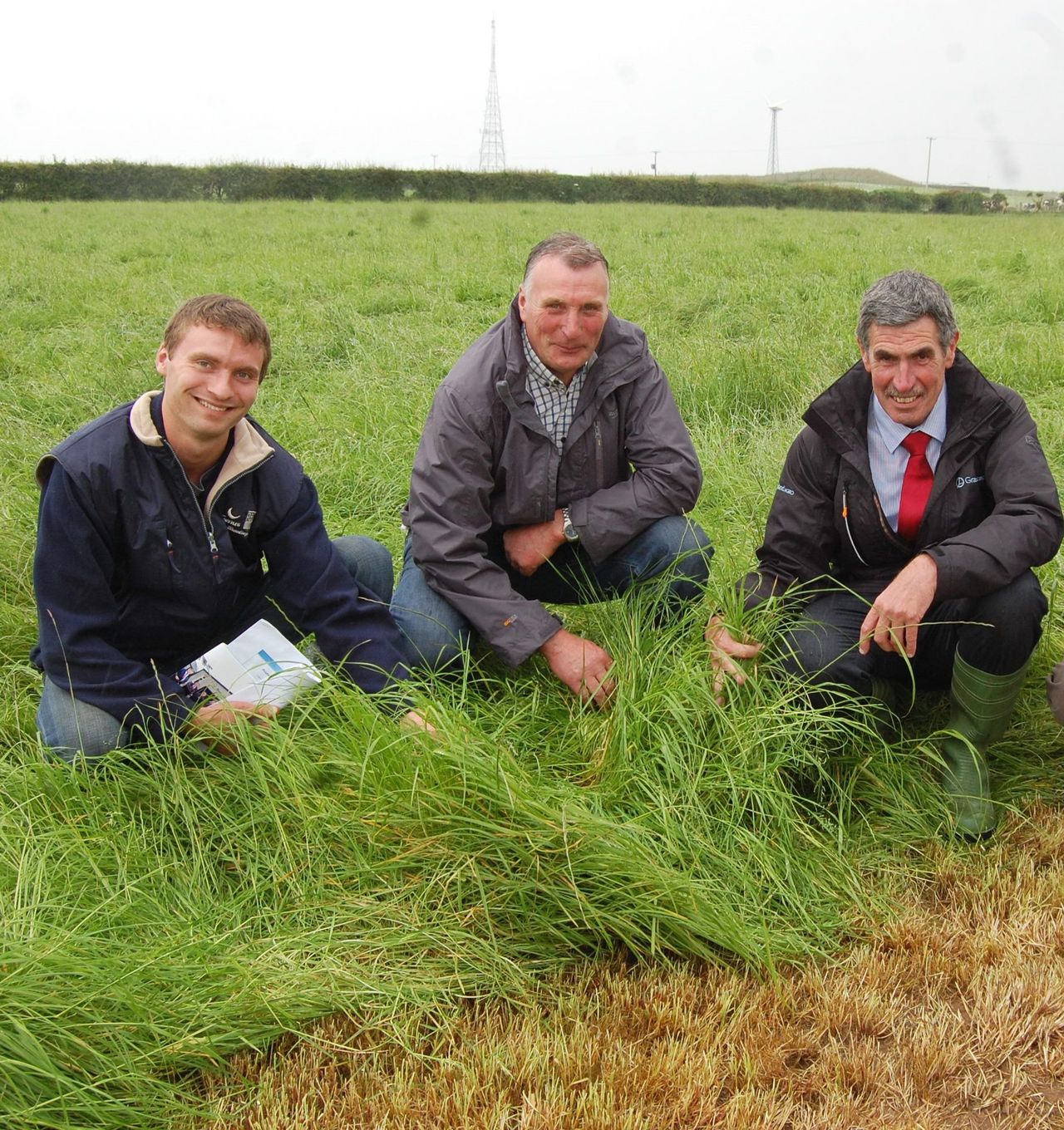 Grassland Agro's Noel McCarey (right) with Mark and James Campbell, from Bushmills in Co Antrim at the recent Open Day hosted by the McCollum family from Coleraine in Co Derry