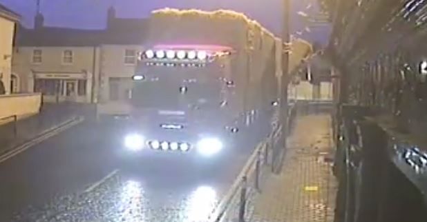 Video: Traffic chaos as lorry sheds its load of hay