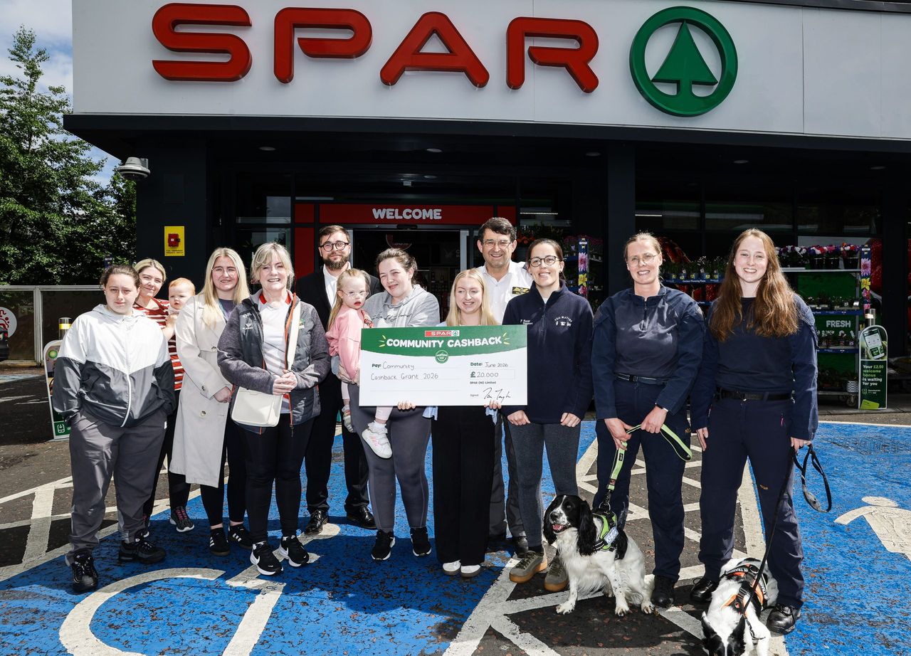  Representatives from Include Youth, The Road Ahead NI, Accidental Theatre, Together 21 NI, SkyWatch NI, Plough On and K9 Search and Rescue, join Bethany Priestly (centre) from SPAR NI, to receive their SPAR Community Cashback Grants. Source: SPAR NI