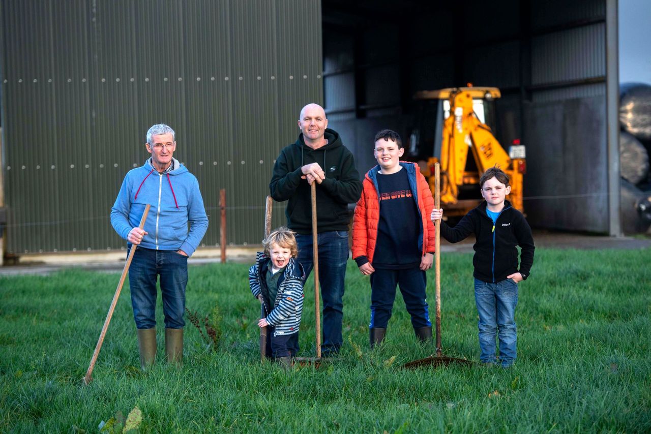 Tom Spillane, with his children and father