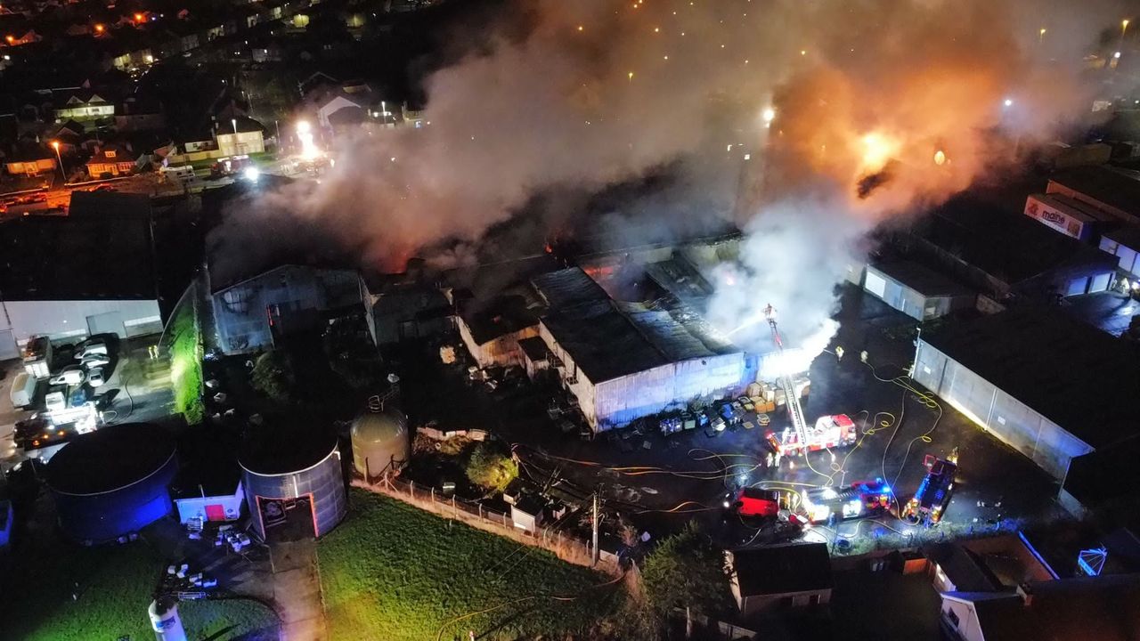 Firefighters battle blaze at former poultry factory