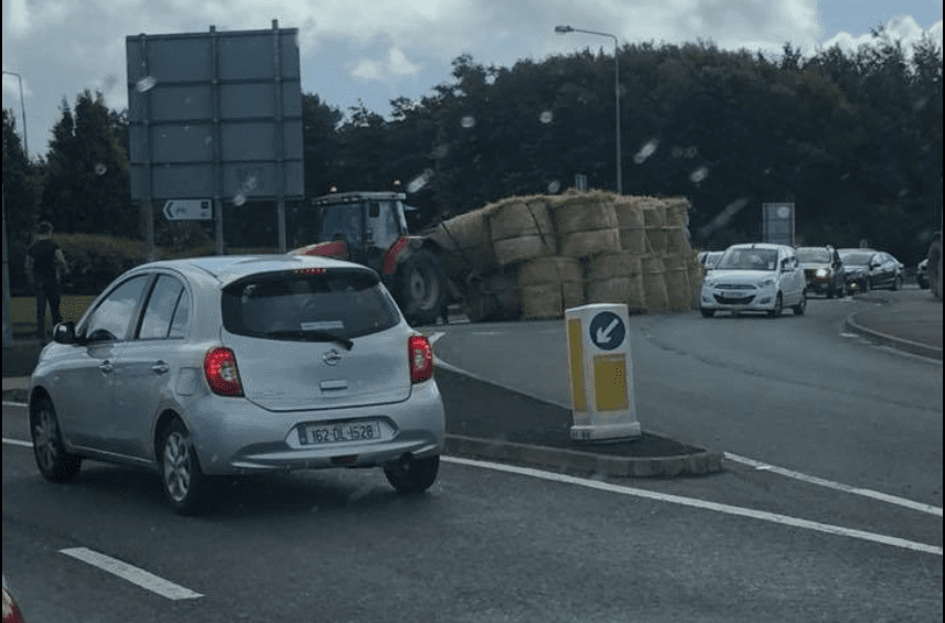 Trailer of bales overturns in Donegal