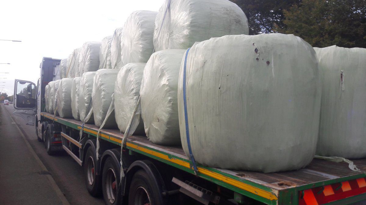 Pics: Haulier stopped for not having bales secured properly