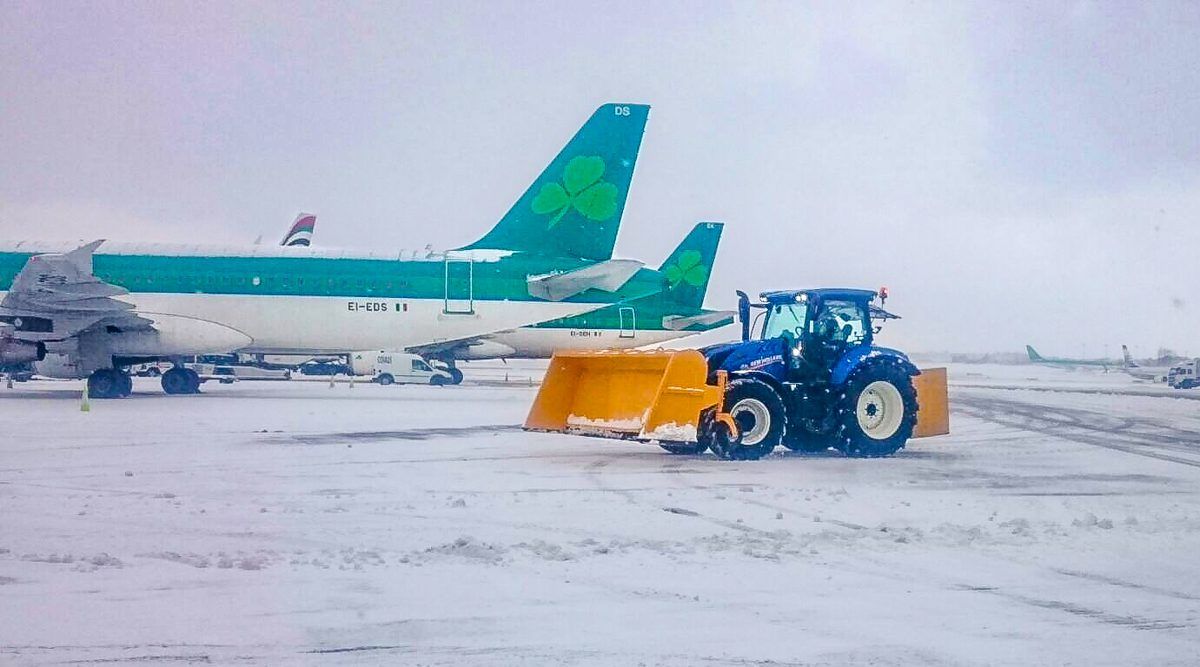 41 New Holland tractors battle today's snow...at Dublin Airport