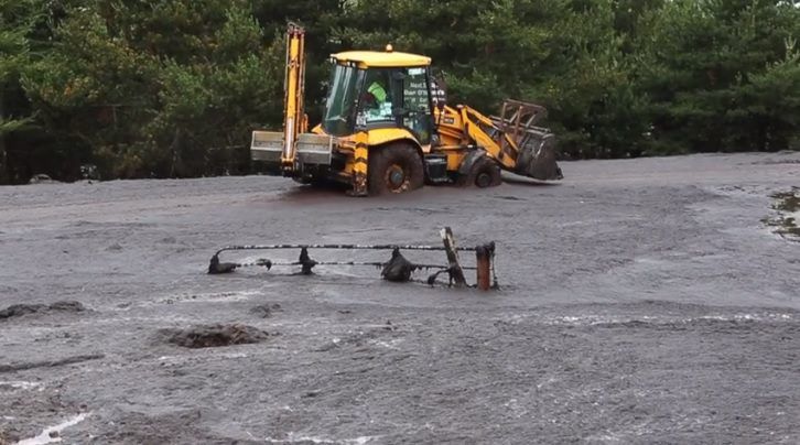 Video: Gates and road submerged in peat after landslide in Galway