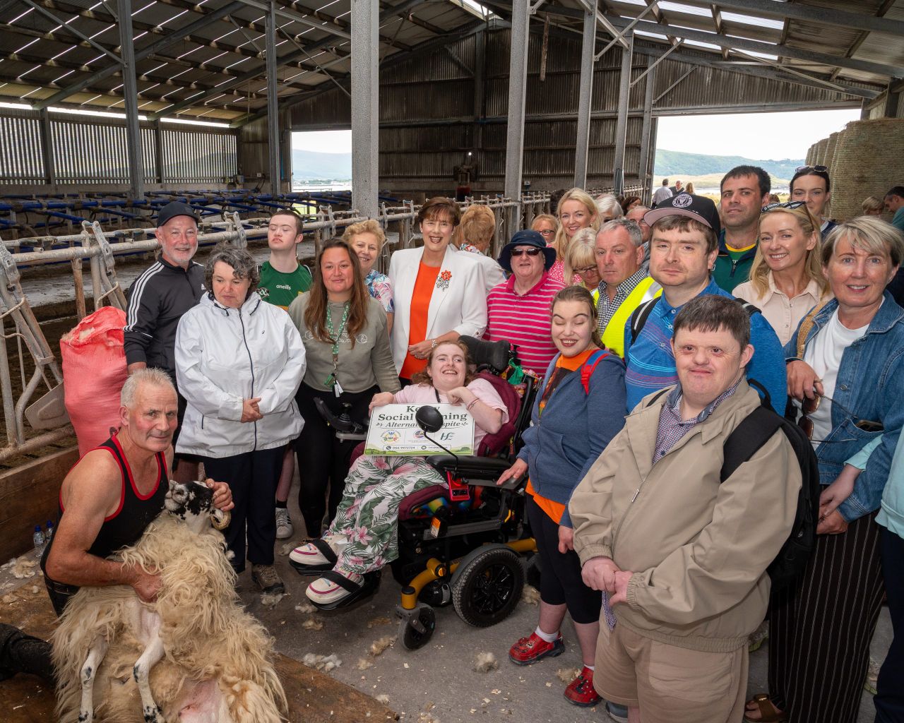 Sheep shearer Patrick Moran with Minister for Children, Disability and Equality Norma Foley and Kerry Social Farming participants and support staff. Source: Ruth Brophy.