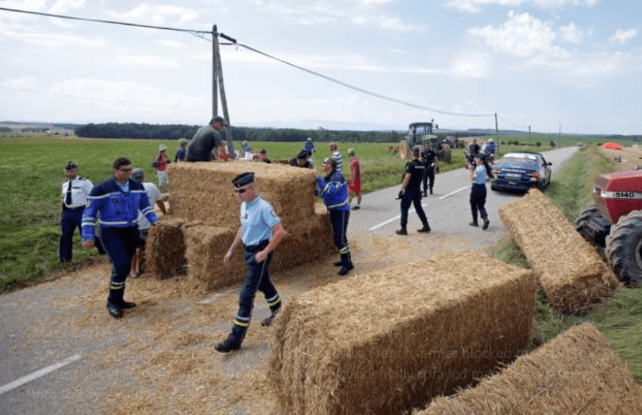 French farmers bring Tour de France to standstill with protest
