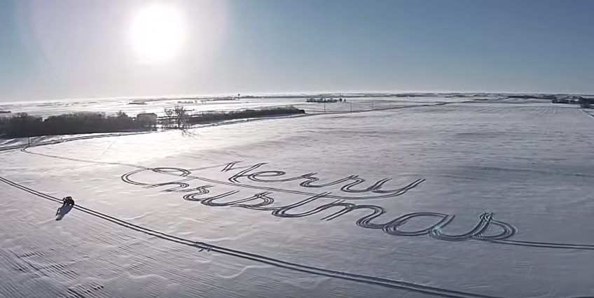 Video: Farmer creates 'Merry Christmas' in snow with tractor