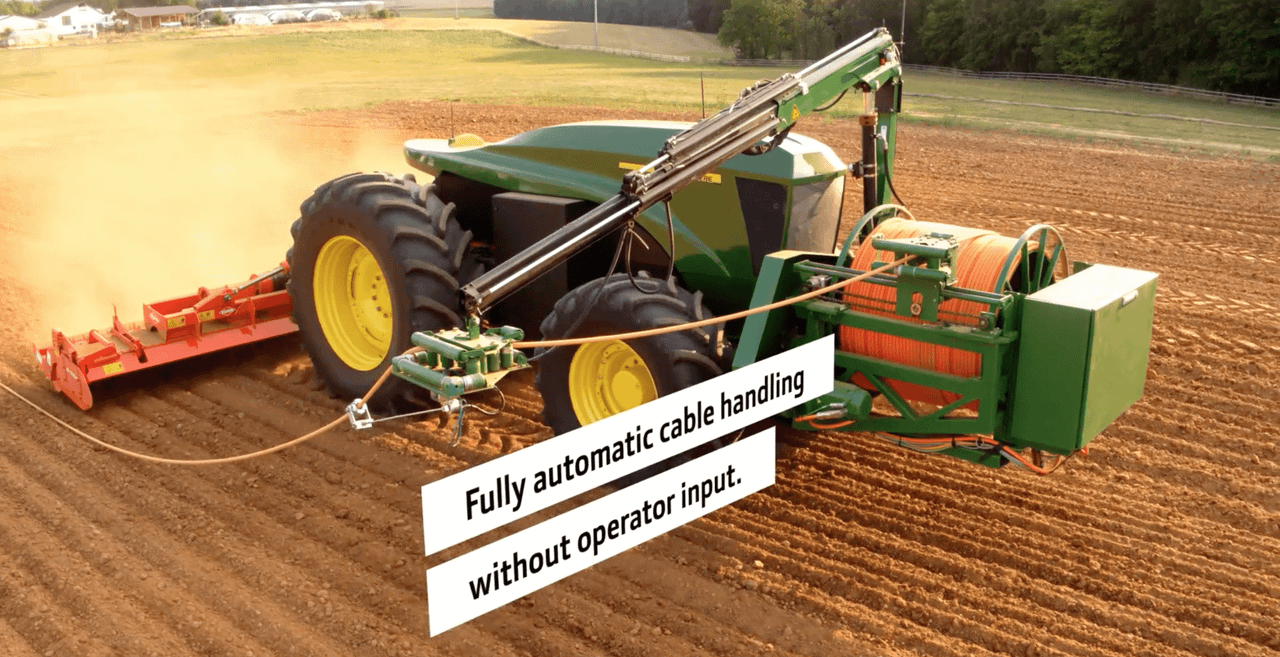 An all-electric John Deere that needs no big battery; just a clever 'extension cord'
