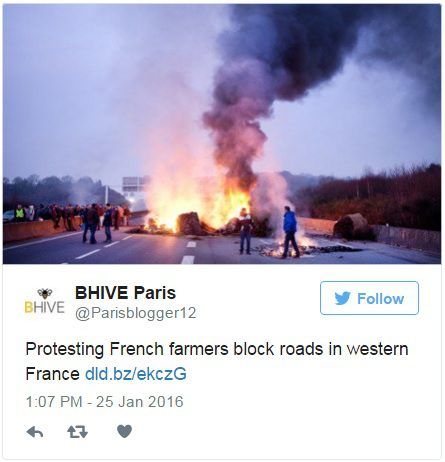 Pics: Protesting French farmers set tyres on fire and block roads with tractors