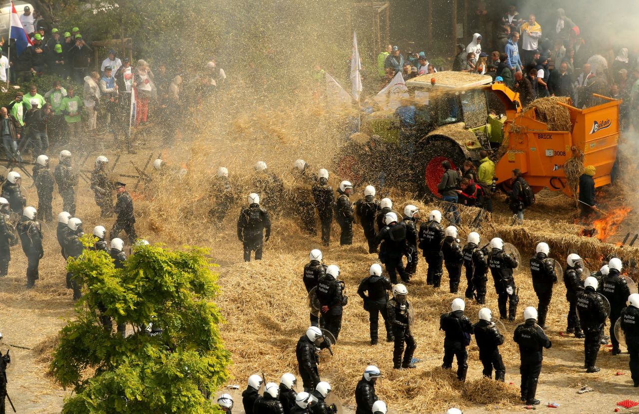 Pics of Brussels protest as 6,000 farmers and tractors hit the streets