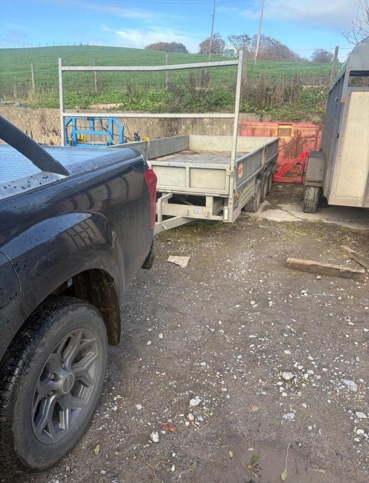 A front image of the missing steel Porter triple axle 16x7ft flatbed trailer. Source: Police Fermanagh &amp; Omagh's Facebook