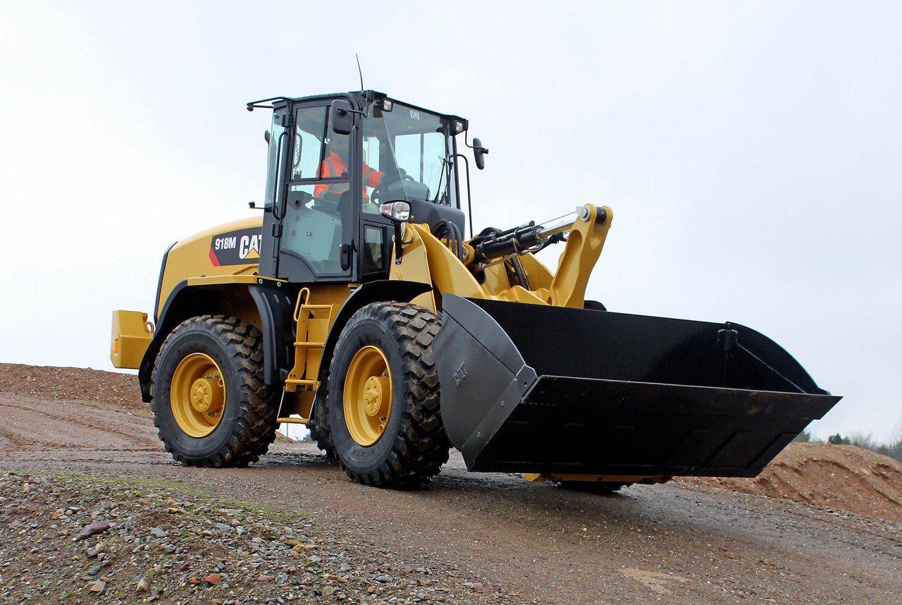 Could this 'compact' shovel be kitted out to tackle any silage pit?