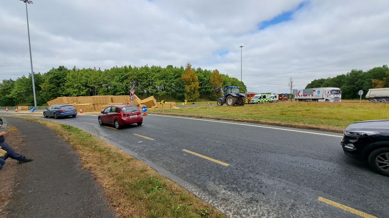 Tractor loses its load of straw after collision on Laois motorway