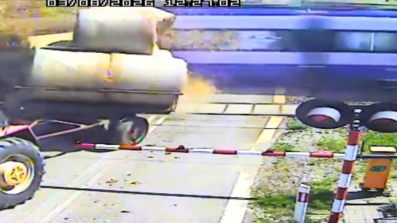 Watch: Train hits trailers in Poland after tractor driver stops on track