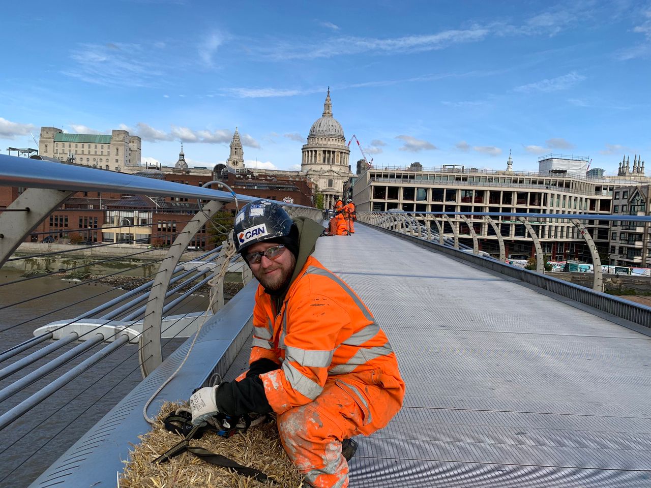 Ancient tradition sees straw bale return to a London bridge