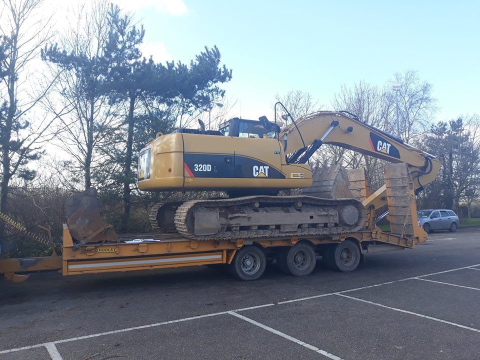 Pic: Tractor hauling excavator stopped for using 'green' diesel and being overweight