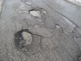 Potholes, neighbours and the law