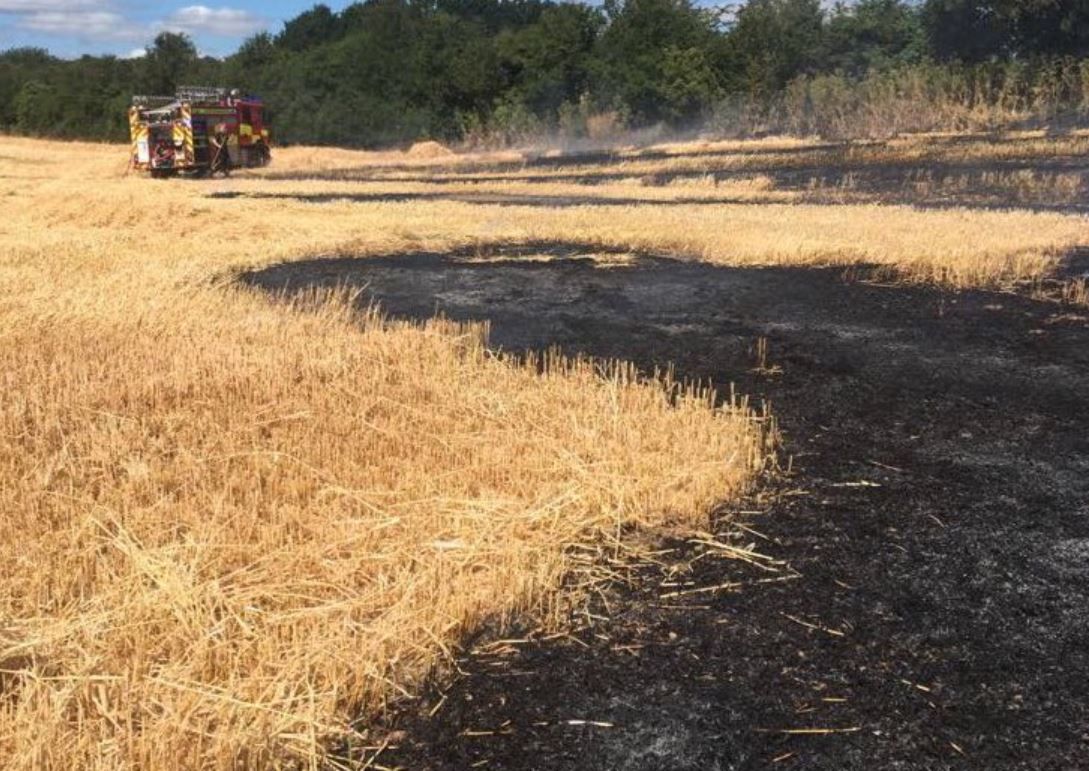 Sparks from combine blade ignites field fire