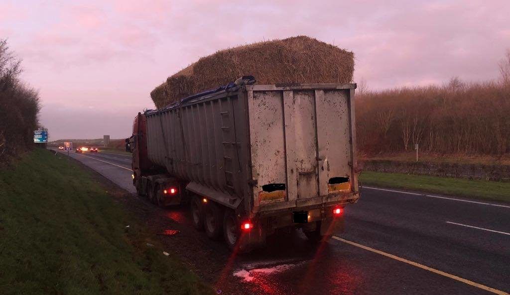 Pics: Lucky escape for motorists as bales fall from lorry on motorway