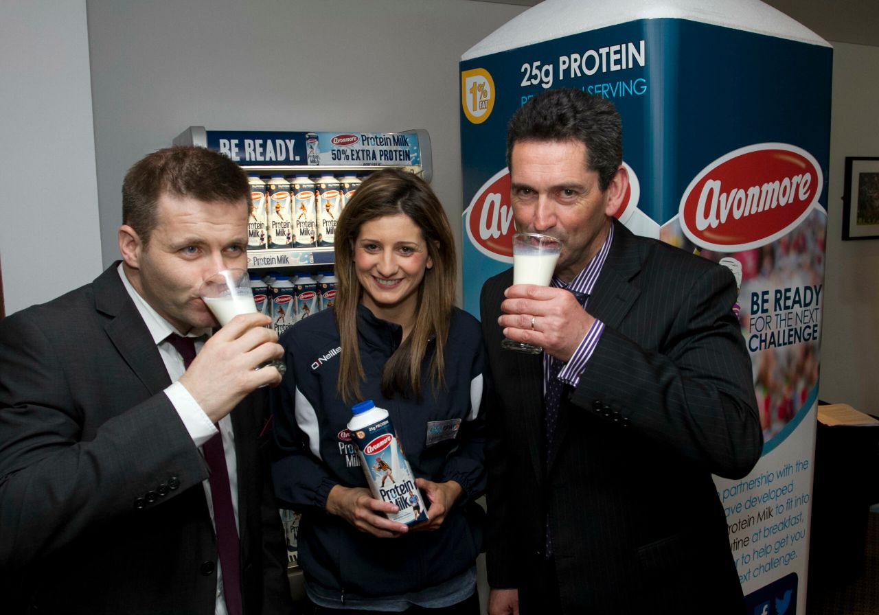Dessie Farrell, CEO of the GPA and Mags D'Arcy, Wexford Camogie player with Michael McArdle, Commercial Director for Glanbia Consumer Foods.
