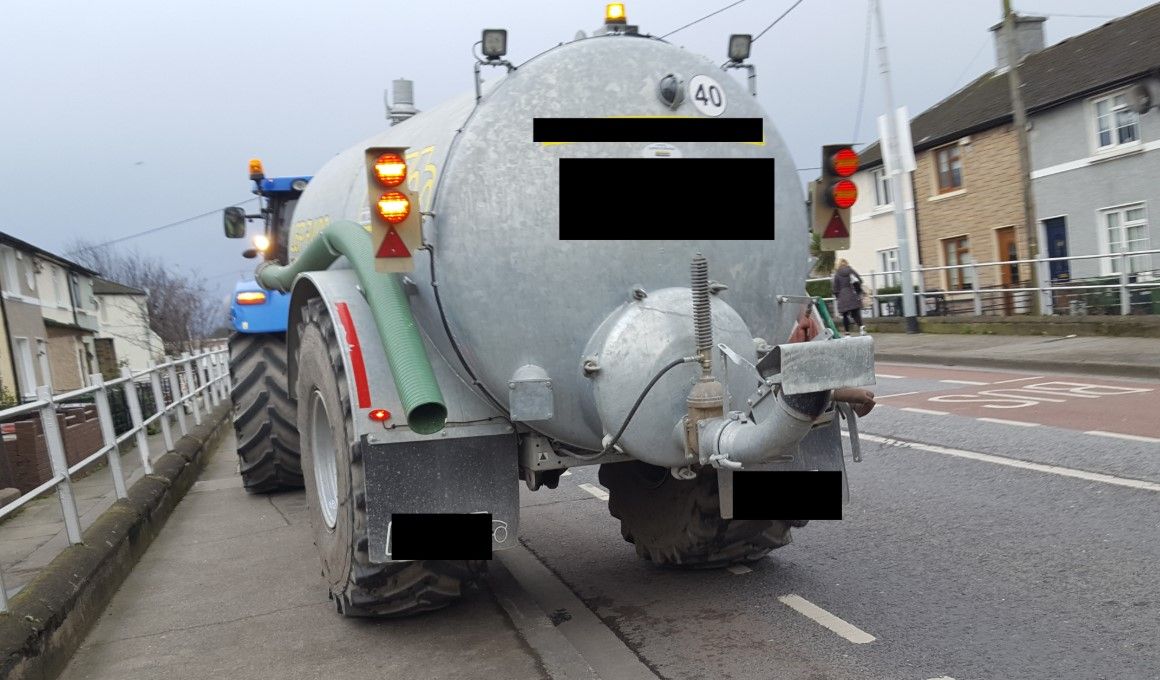 Tax trouble for tractor with tanker in town