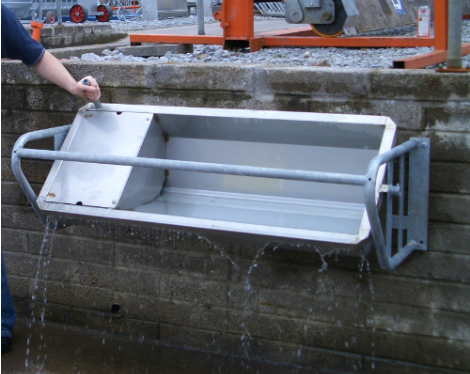 Tired of cleaning out water troughs? Then a tip-over drinker might be for you
