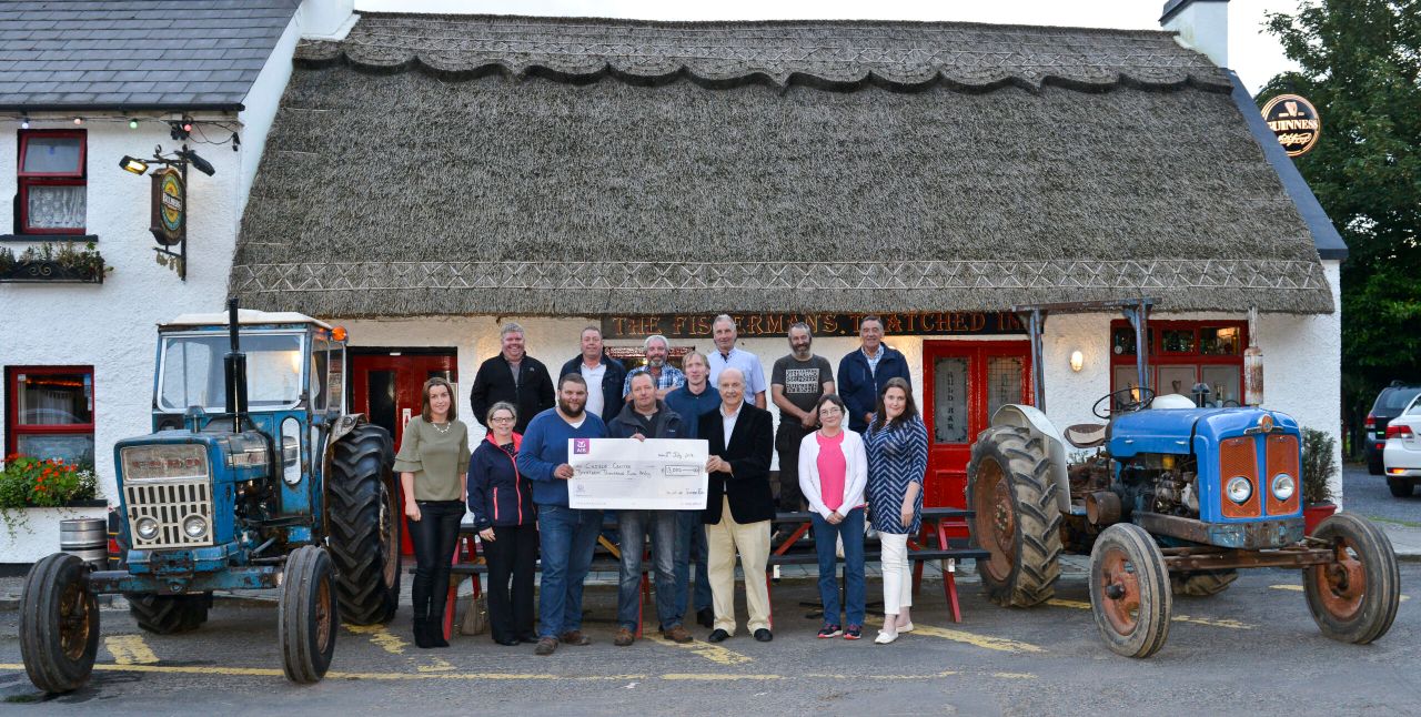 Classic and modern tractors hit the road for charity