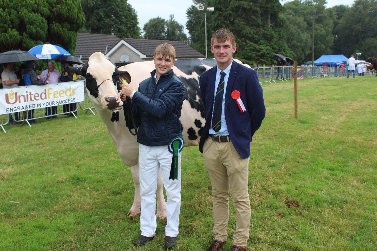 Slatabogie Lambda Alysia with James Gregg on the halter and Clogher Show 2026 Holstein judge, Matthew Flanagan, from Co. Louth