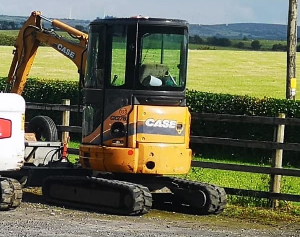 Mini digger and 2 trailers stolen from yard in Mayo