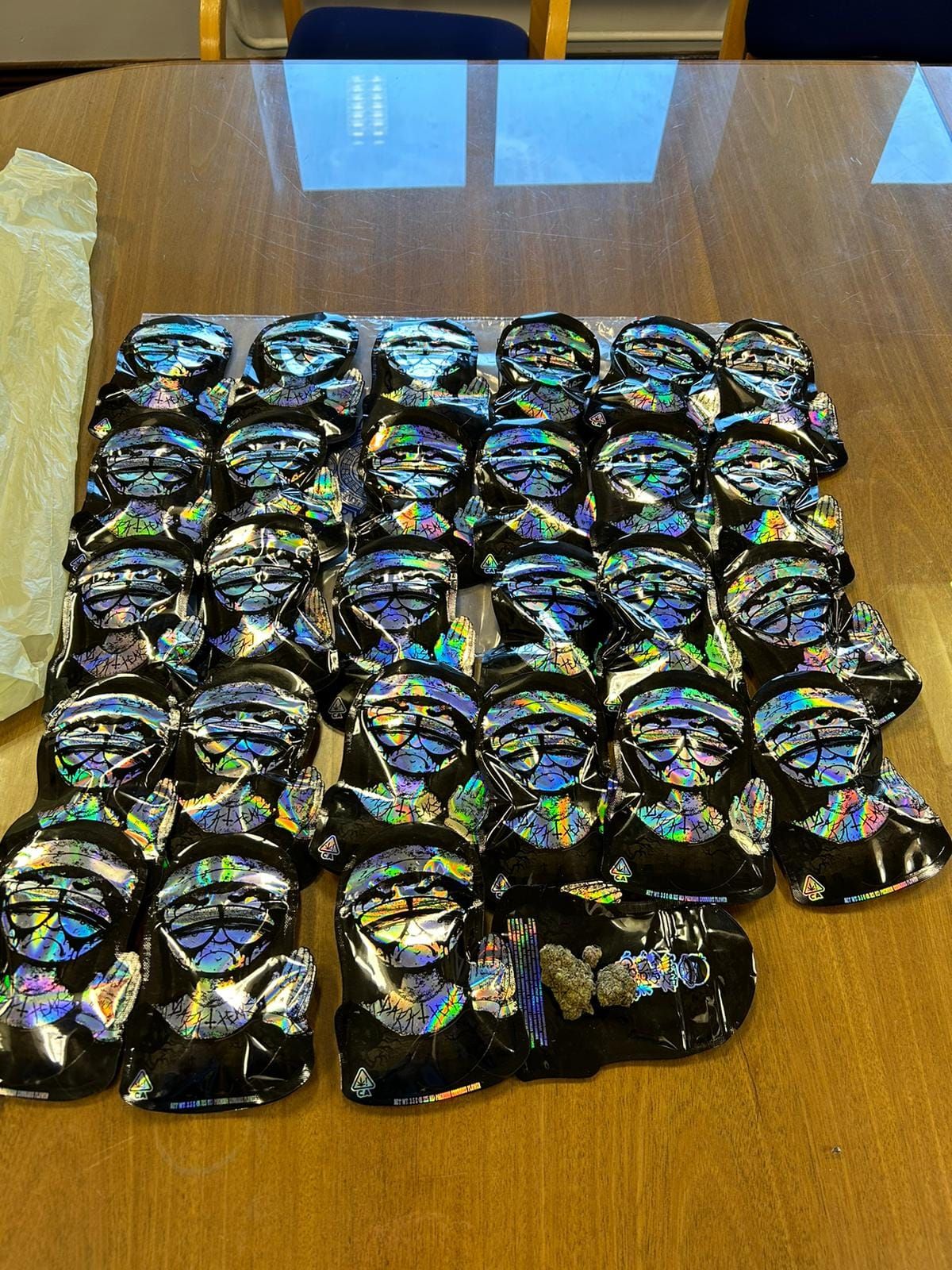 Two arrested packaging drugs in a 'disused agricultural area'