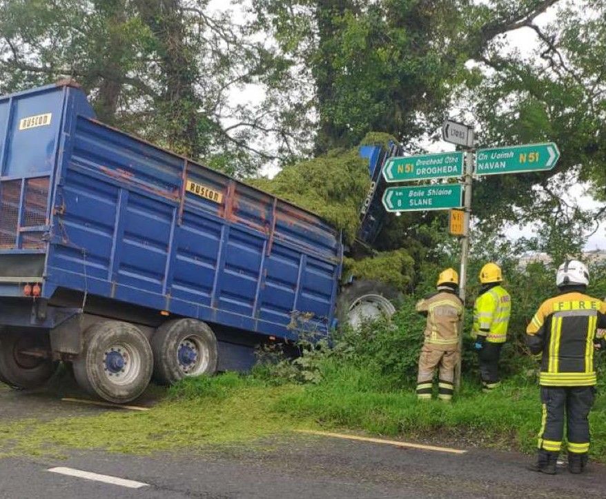 Crane brought in to extract tractor from collision scene
