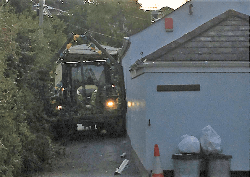 Rock and hard place: Tractor driver mishap