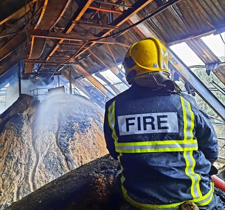 Pics: Cork fire crews deal with 'hotspots' 3 days on from R&H Hall fire