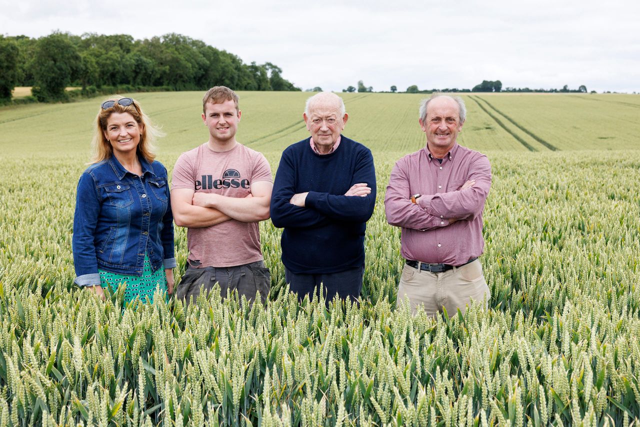 Three generations of the Shine family in a field of winter wheat at their family farm in Cahir, Co. Tipperary