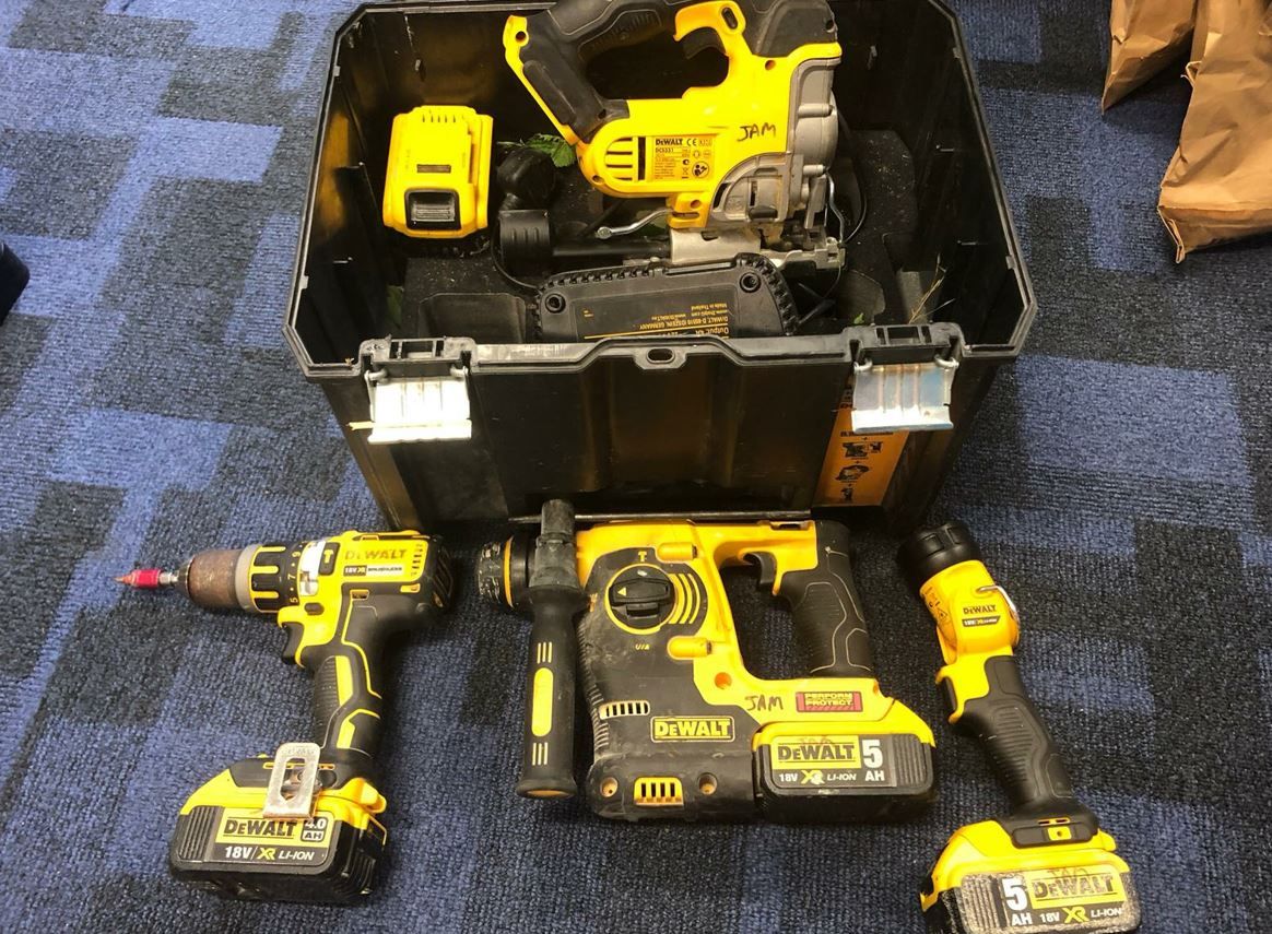 Woman charged after stolen power tools recovered