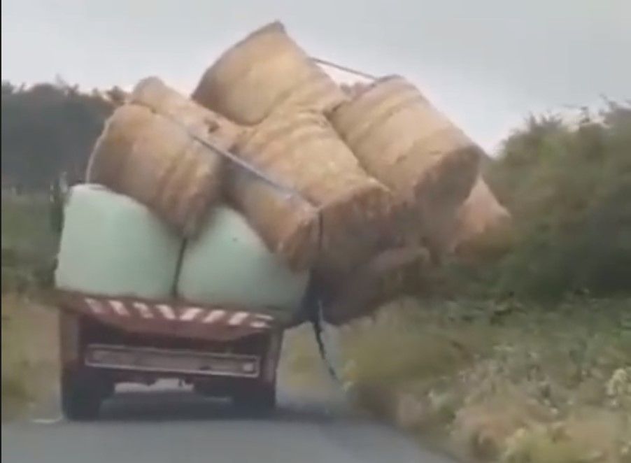 Video: Off-balance bales send trailer teetering