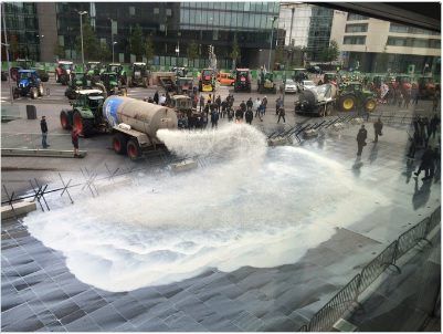 Tankers spray 40,000L of milk over EU buildings in Luxembourg in protest