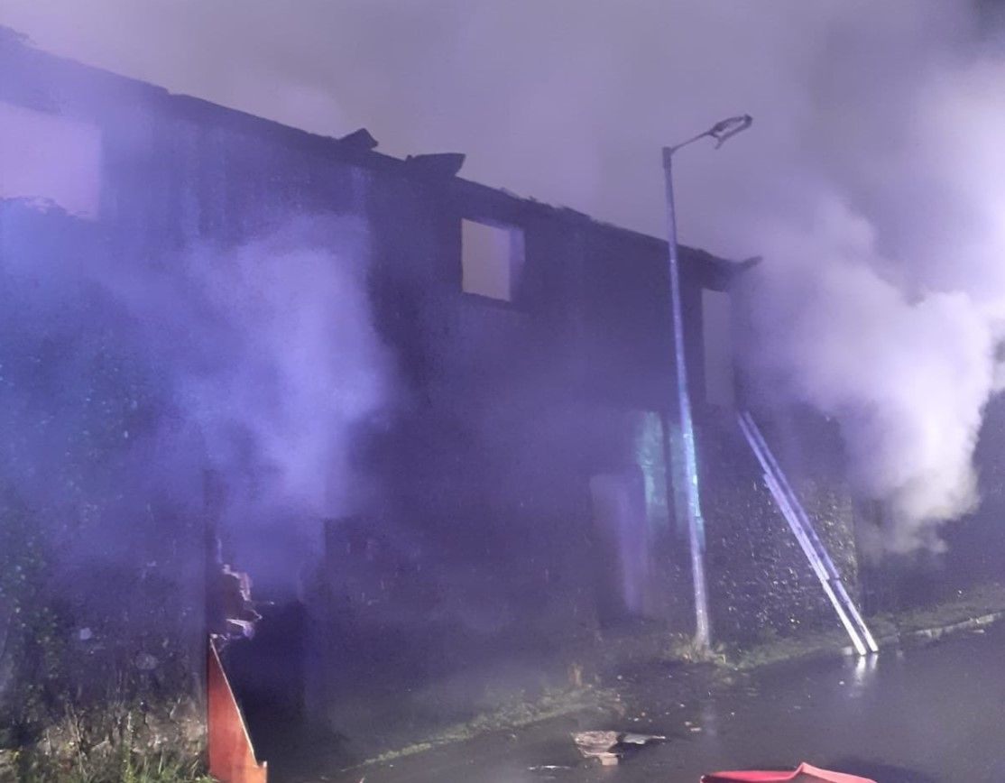 Male 'seen running from scene' of fire at old co-op building