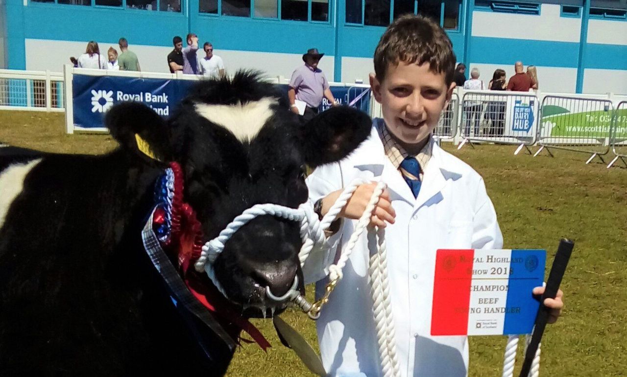 Young Limousin breeder manages major show hat-trick