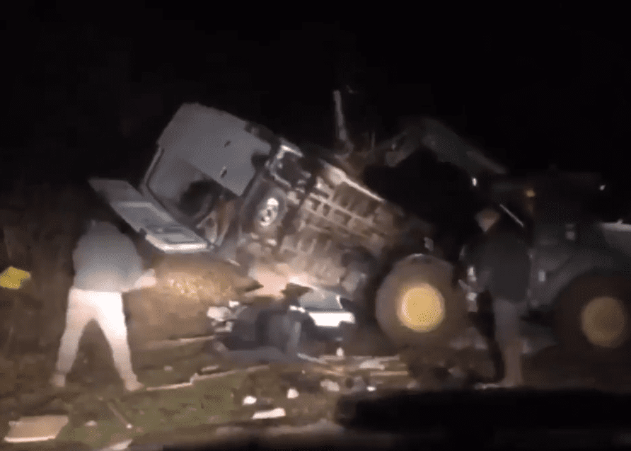 Farmer overturns van 'dumping rubbish' on his land