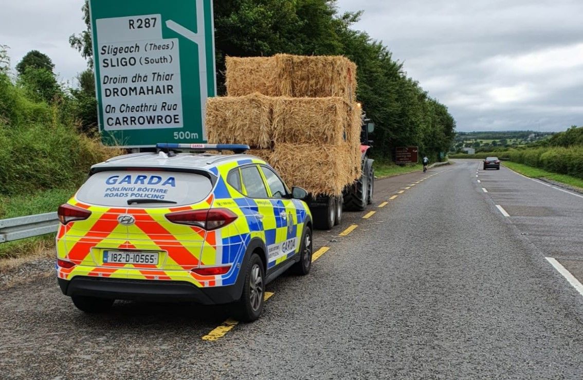 'Writing on the wall' for tractor driver drawing bales