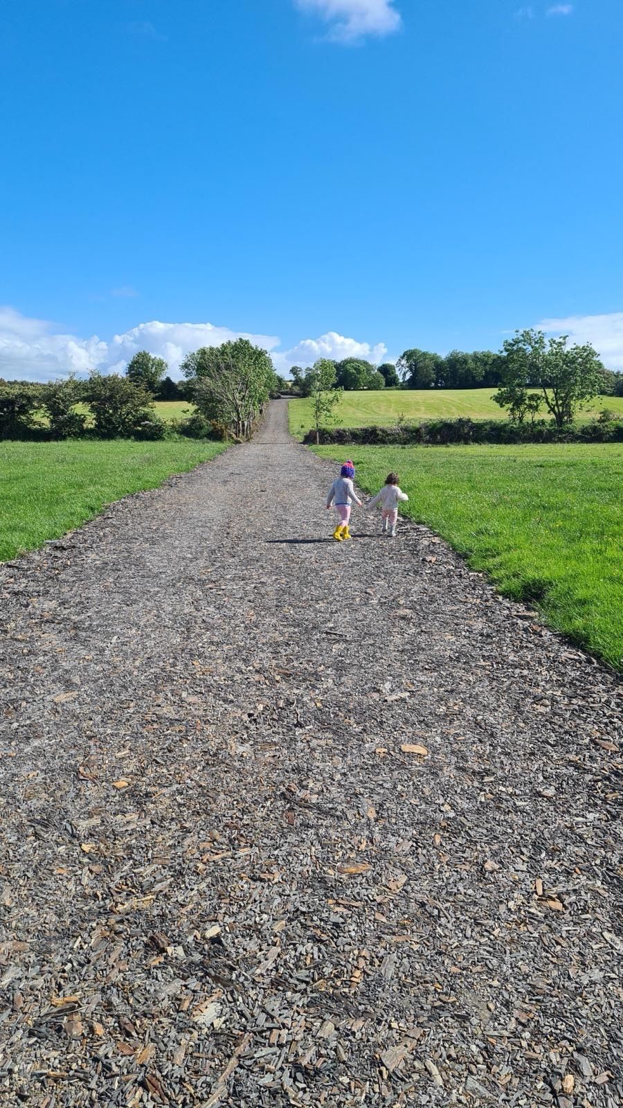 Denis' children enjoying the good weather on the freshly renovated laneways