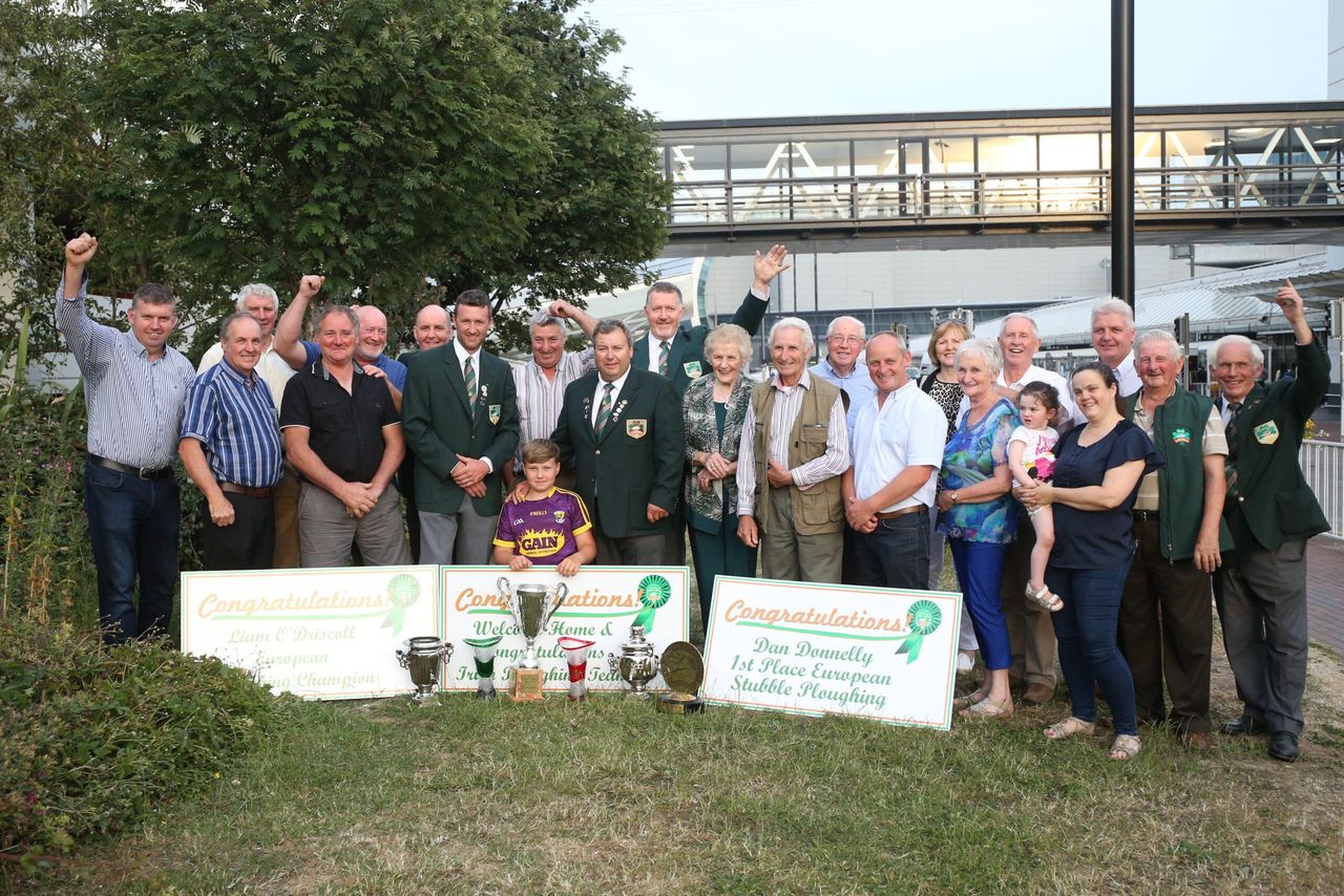 Ploughing team hailed as heroes on return from Russia