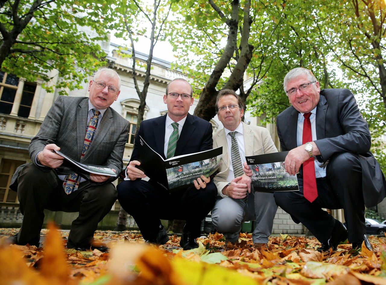 The Minister for Agriculture, Food and the Marine, Simon Coveney, with John Phelan, Chair of COFORD Council Forest Research Working Group (CCFRWG), Tom McDonald, Department Forest Service and Minister of State Tom Hayes.